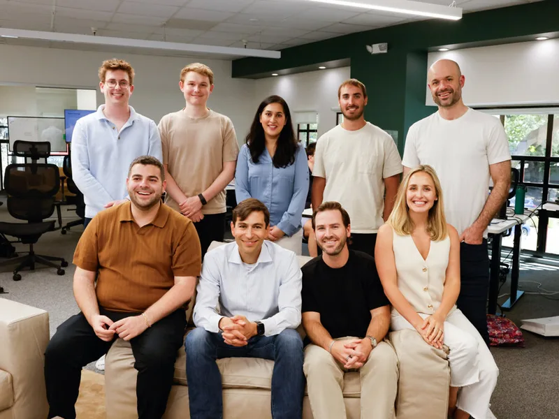 Nine teammates on the office couch