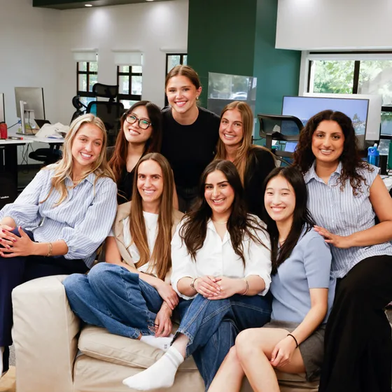 Eight teammates on the office couch